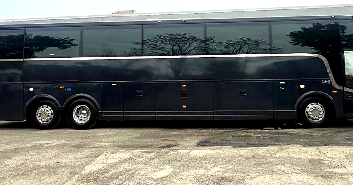 Black 56-passenger executive coach bus exterior from RDV Limousine, charter bus service in DC, Maryland and Virginia